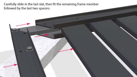 The last frame member being fitted with last slat in place.