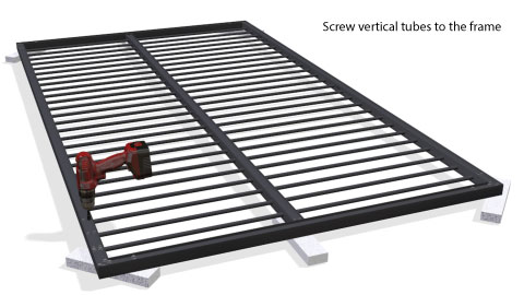 The cordless drill screwing the vertical tubes to the frame